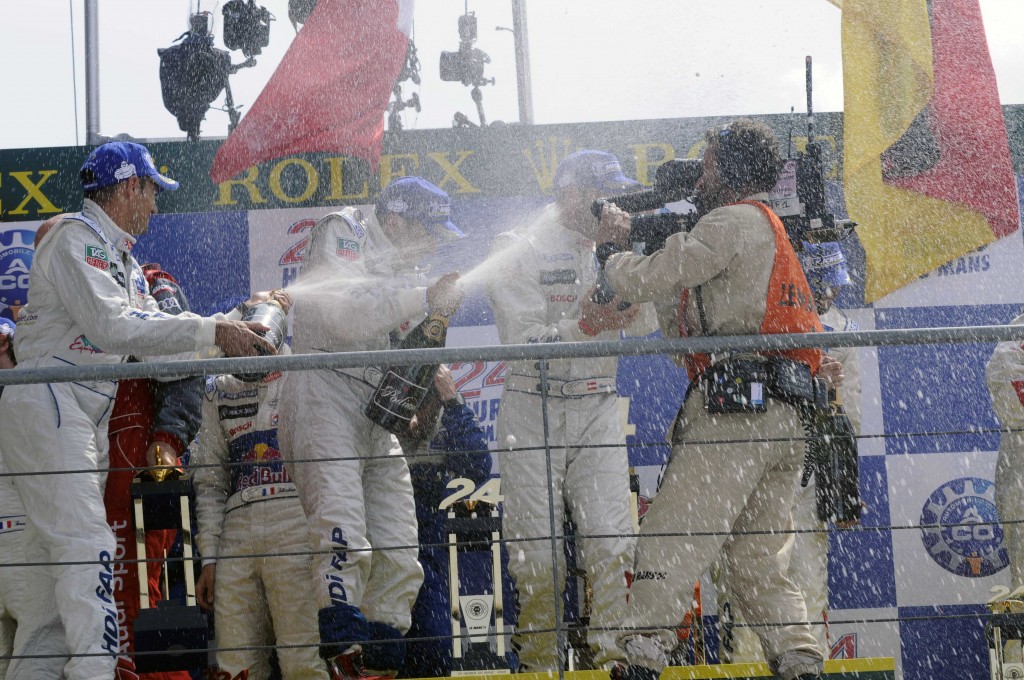 The champagne flowed freely on the victory stand after the Peugeot claimed the overall trophy.